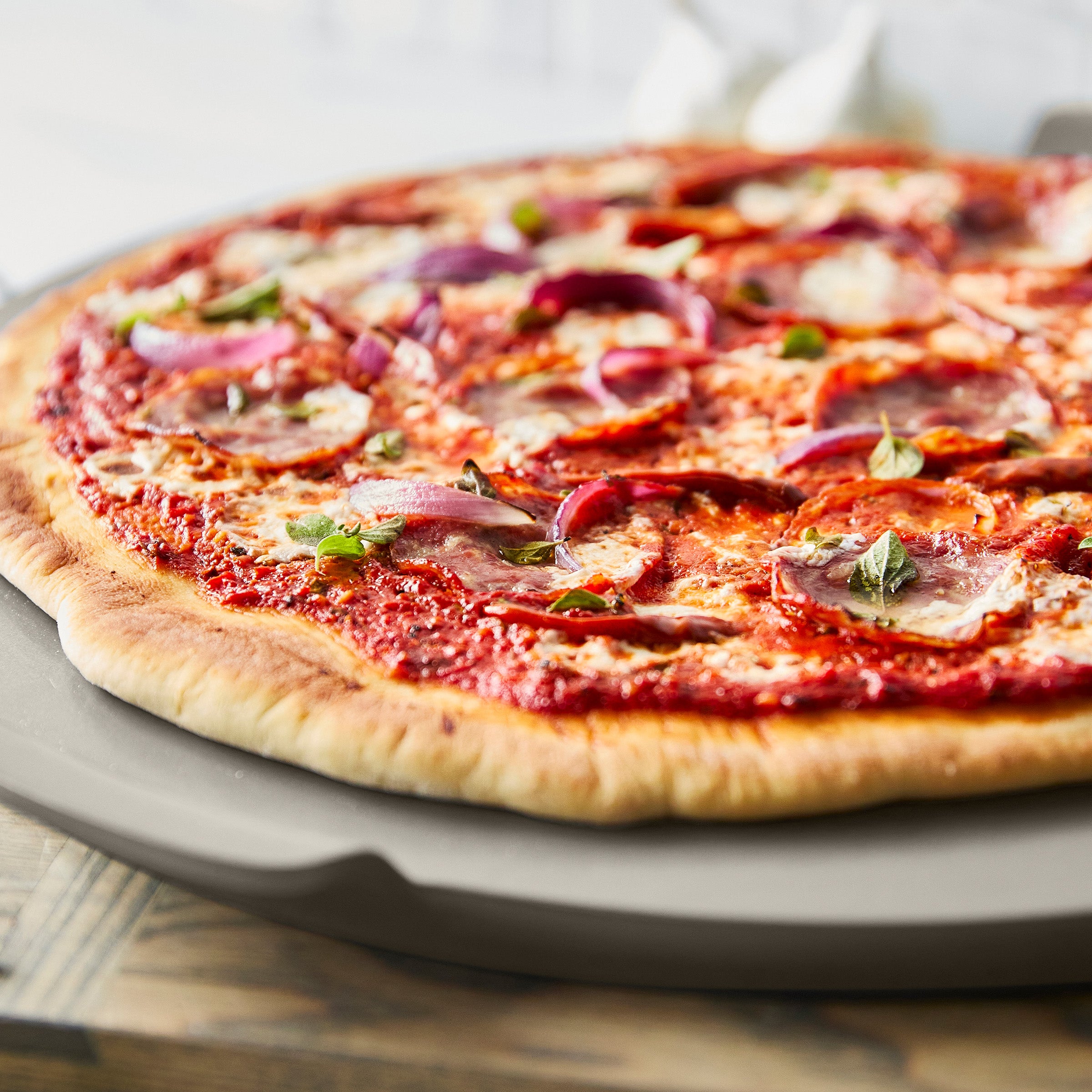 GreenPan Premiere Ovenware 16.5-Inch Round Pizza Baker | Taupe